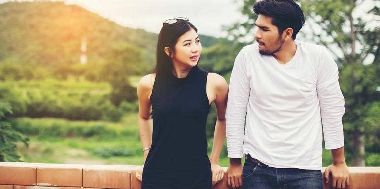 How To Stop Verbal Abuse With One Simple Trick woman and man leaning against fence post