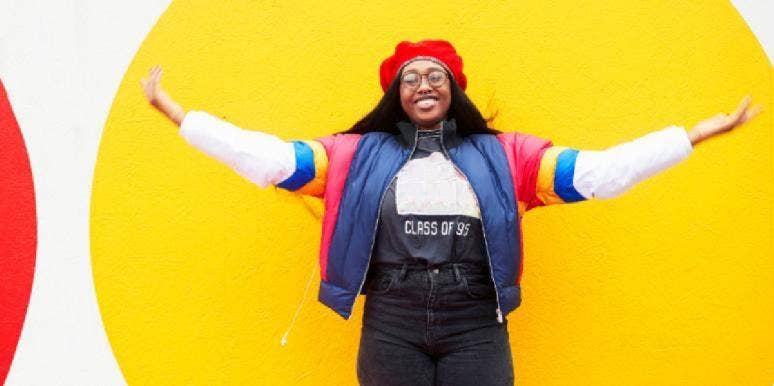 10 Popular Colors + The Spiritual Meaning Of Each woman wearing colorful jacket
