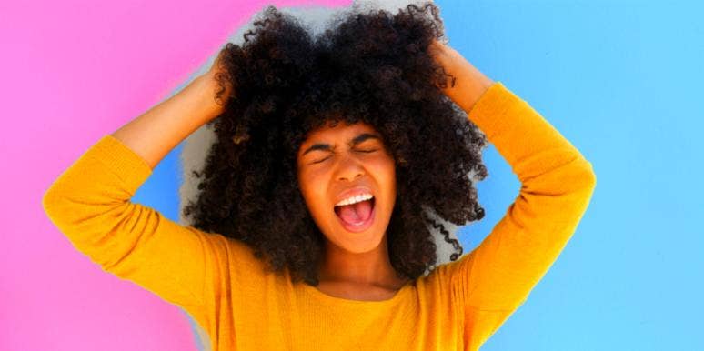6 Stages Of A Breakup & How Each Helps You Cope With Grief woman holding hair and screaming