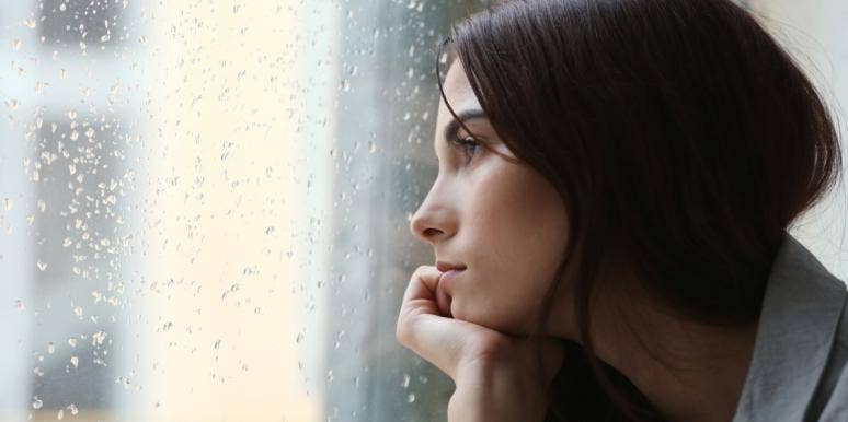 Stop Making Excuses For People Who Hurt You Over And Over Again woman staring out the window