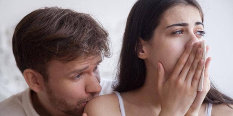 How To Get Out Of Victim Mentality In A Toxic Relationship woman crying and being held by man