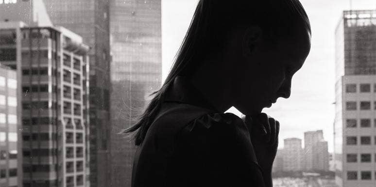Why I Finally Stopped Seeking Your Approval woman's silhouette by window