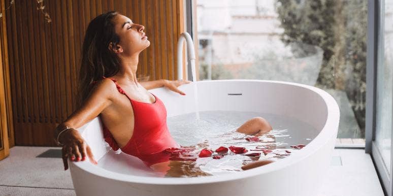 stress reduction woman relaxing in a bath