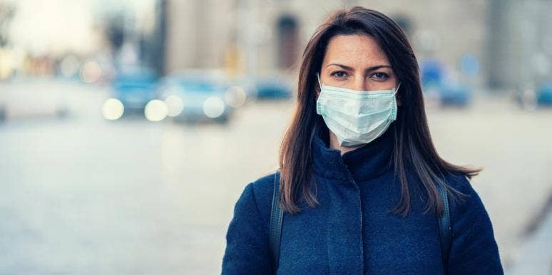 stressors that lead to depression woman in a mask