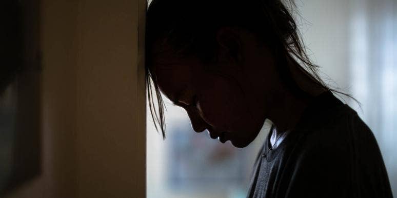 I Struggled With Parenting After My Dad Died sad woman