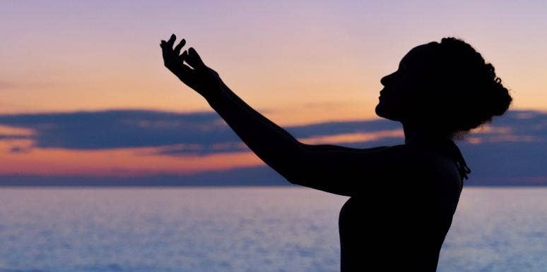 Silhouette of woman at sunset Silhouette of woman at sunset
