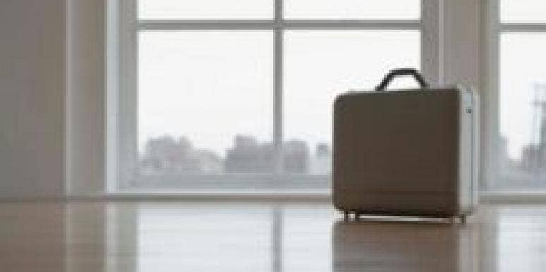 suitcase in an empty room