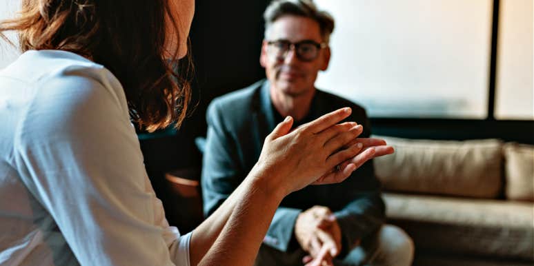 Disagree with therapist woman talking to therapist in an office with big windows