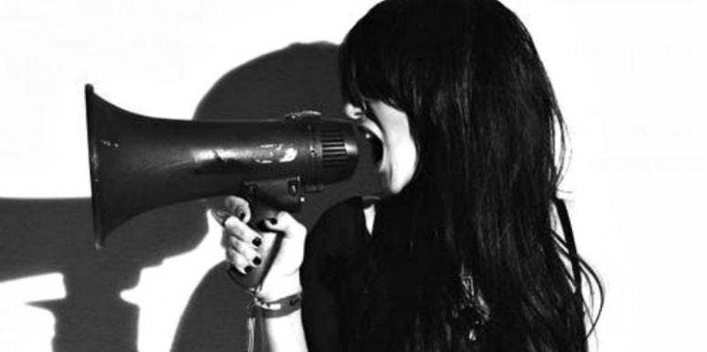 woman with megaphone woman with megaphone