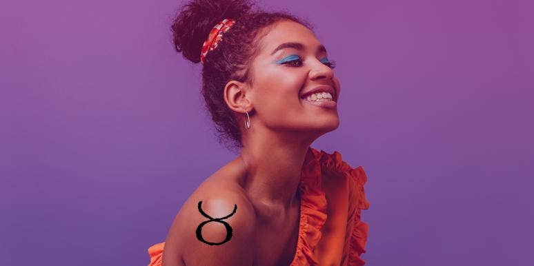 Taurus Woman: Love, Personality Traits And Facts woman wearing blue eyeshadow with taurus tattoo on shoulder