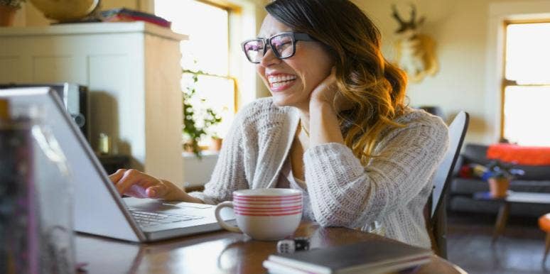Physical Traits That Make Women Most (And Least) Attractive To Employers woman looking at computer
