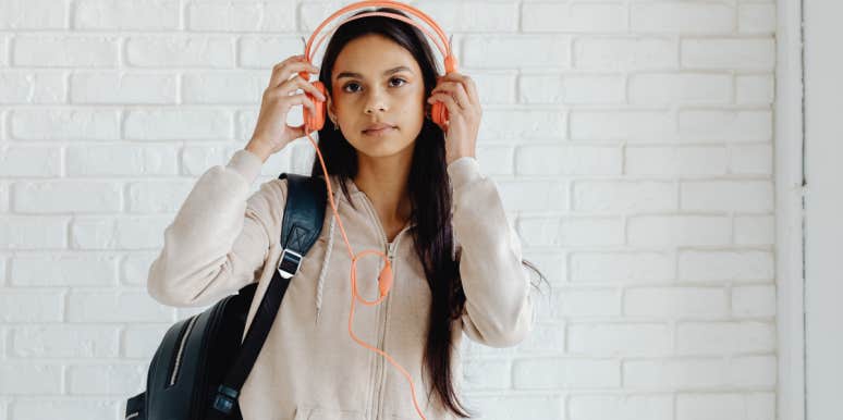 Teen girl wearing headphones