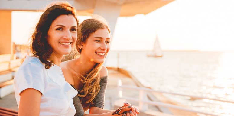 Teenager controlling relationship Mom with teenager looking out over the water