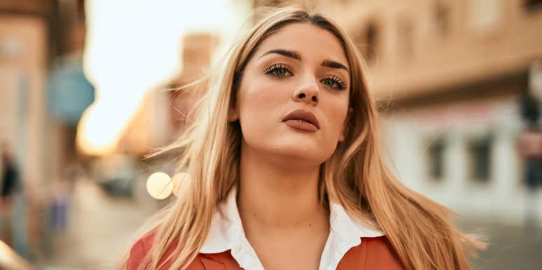 8 Things To Consider Before Giving Up On Love woman walking through street