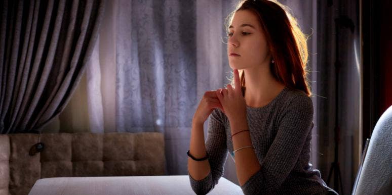 What You Really Mean When You Say Those Three Empty Words sad woman looking away