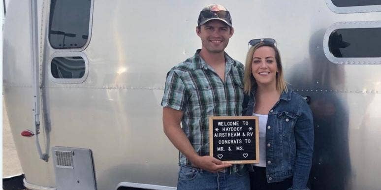 Heather and Austin Inspiring Story Inspiring photo of Heather and husband Austin captured in front of their Airstream
