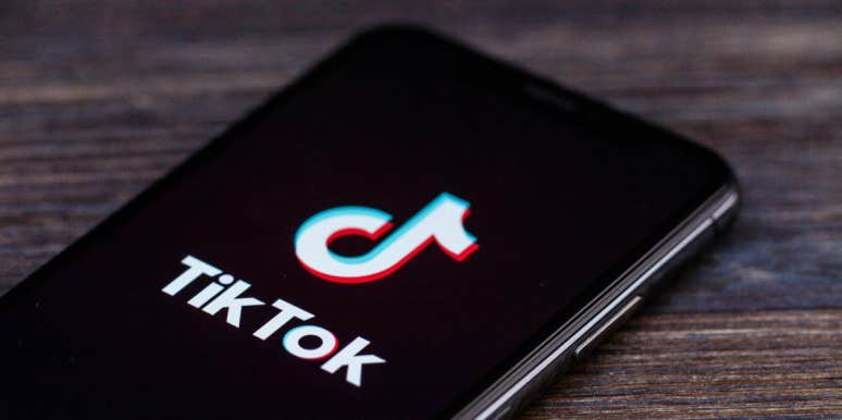 TikTok Trend Exposes 'December 17' School Shooting Threats Across The Country TikTok on phone