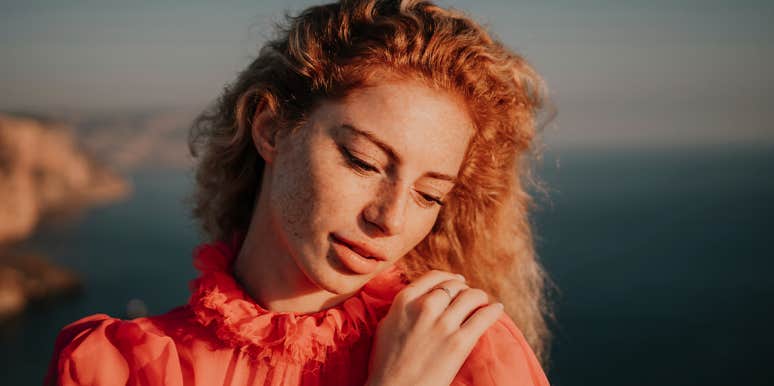 What Tinder Made Me Realize About My Self-Esteem woman hugging herself
