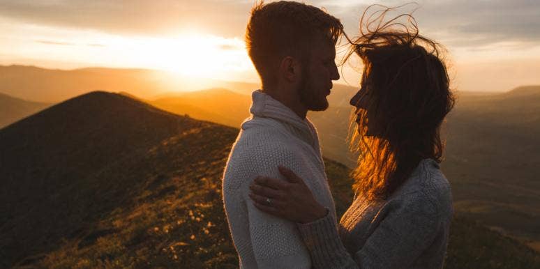 couple embracing at sunset