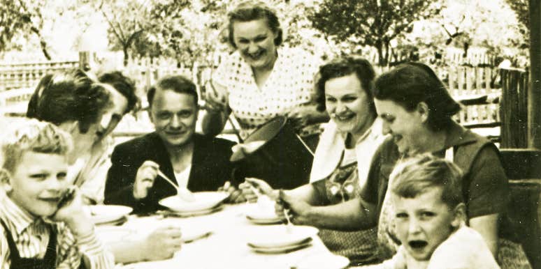 Survive holidays with toxic family vintage photograph of a family at dinner