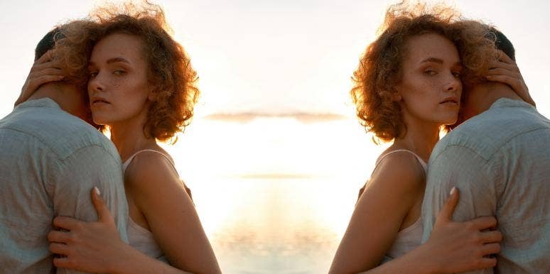 How To Tell The Difference Between A Protective Boyfriend & Toxic Jealousy uncertain woman hugging a man