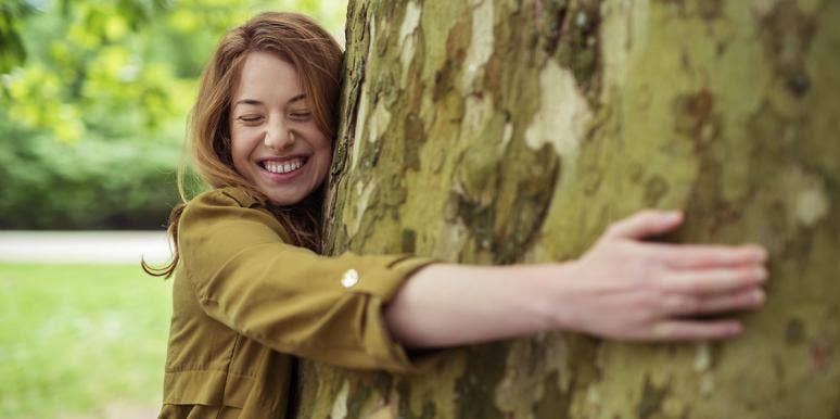 Meet The Woman Who Plans To Marry A Tree woman hugging tree