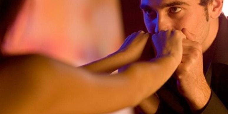 True Love: Are Men More Romantic Than Women? man kissing woman's hand