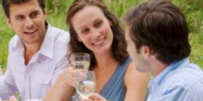 How To Stay Friends With An Ex And Still Move On two men one woman in middle outdoor party toasting