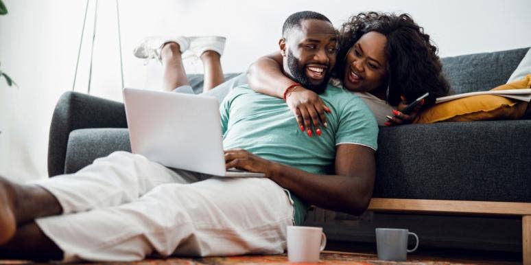 8 Unromantic Signs You're In A Healthy Relationship couple at home