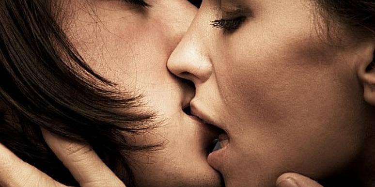 up close look at two people kissing