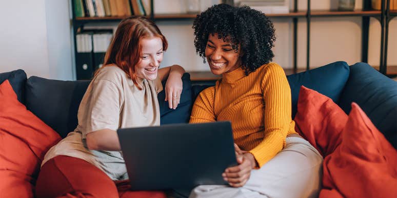 50 Best Useless Websites For Wasting Time Online women laughing on computer