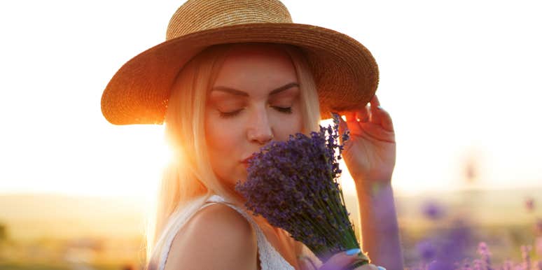 25 Unconventional Ways To Use Lavender To Calm & Soothe You woman smelling lavender
