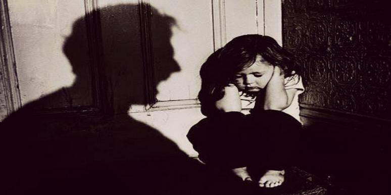 little girl cowers from violent father little girl cowers from violent father