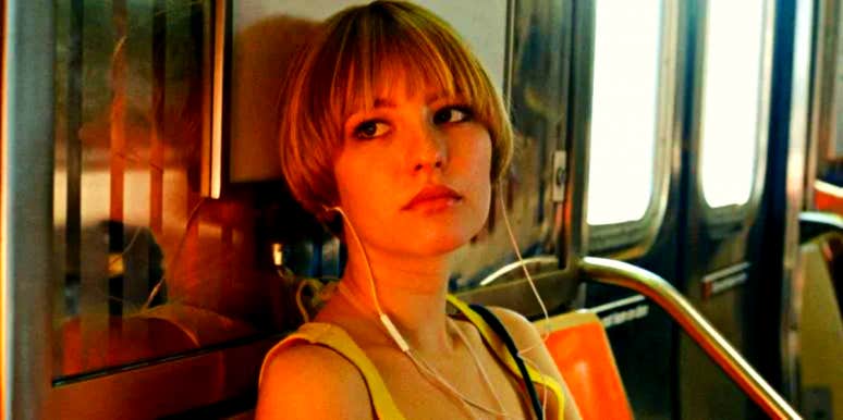 Was Breaking Up A Mistake? 5 Signs You're Right To Regret It woman looking sad and forlorn out the windows of the subway