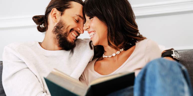 couple spending time together reading a book