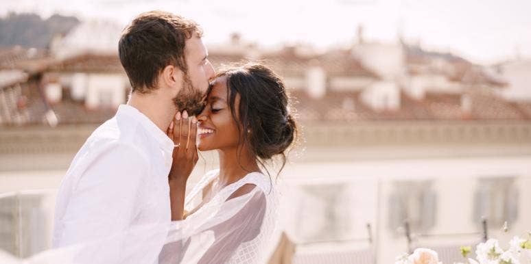5 Wedding Planning Actions That Can Predict The Success Of Your Marriage husband kissing wife forehead