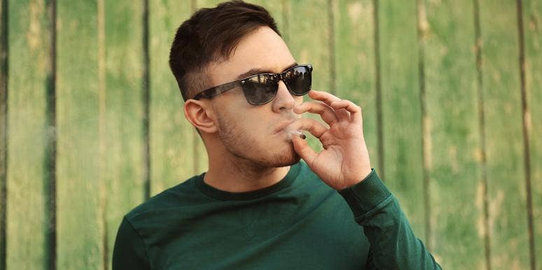 I'm A Better Parent When I'm Stoned man smoking marijuana