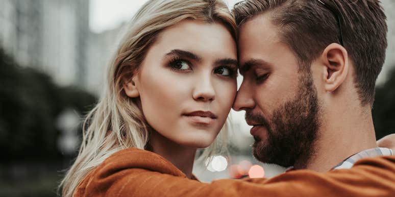 women and man hugging