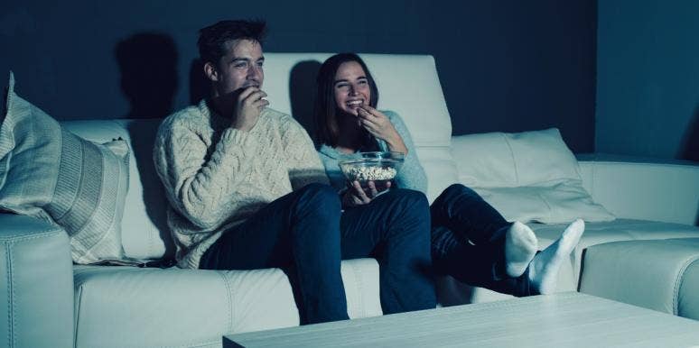 couple on couch watching TV