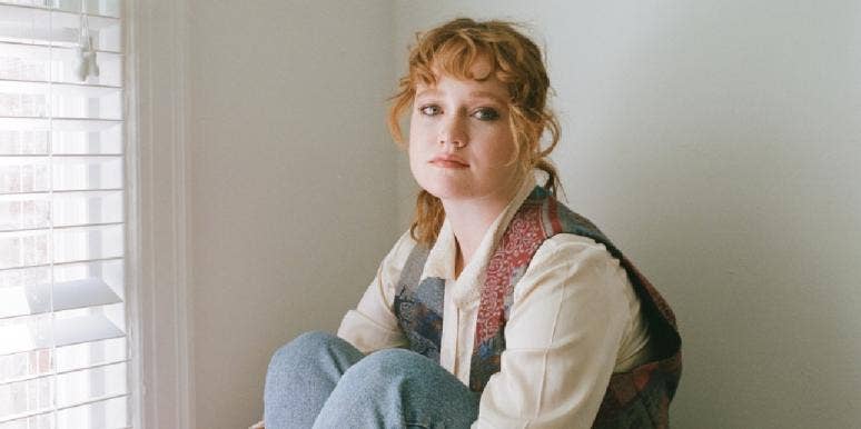What Divorce Teaches You About Marriage — 10 Tough Lessons Every Divorcee Learns sad woman red hair in jeans staring forward
