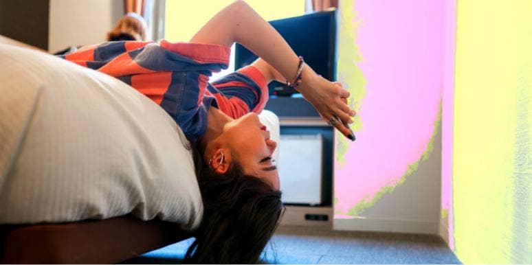 What Does TLDR Mean? Slang Meanings & Definitions girl on the phone head hanging off the bed