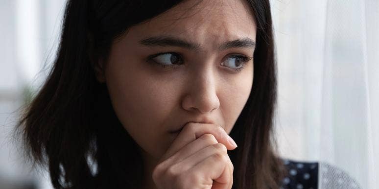 What Is Fear? Definition, Causes & Treatment Explained woman feeling fear