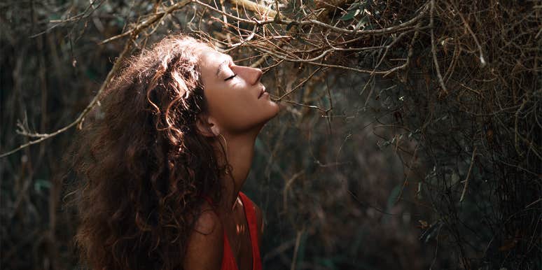 5 Signs You Have A Strong Personality (But Are Also Super-Sensitive) woman in woods
