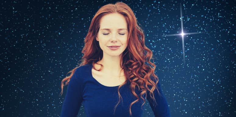 woman with eyes closed over night sky background