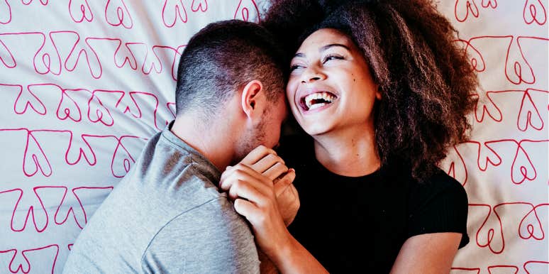 sign that a marriage can last couple snuggling, wife laughing
