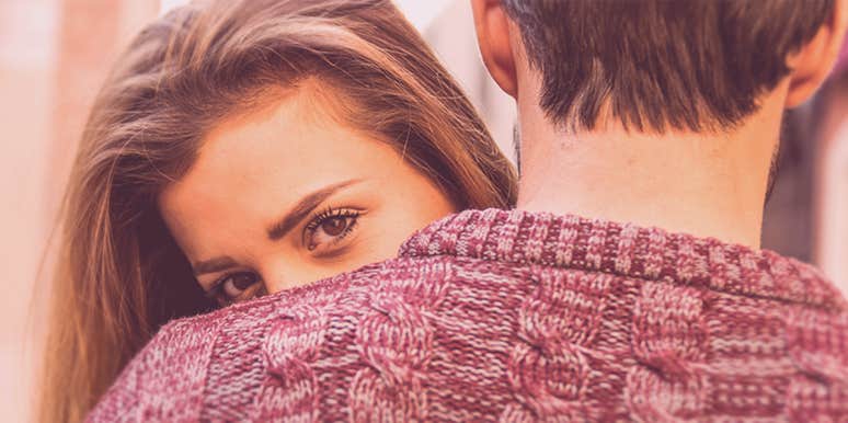 What Men And Women Look For In A Mate, According To Evolution woman looking into the camera