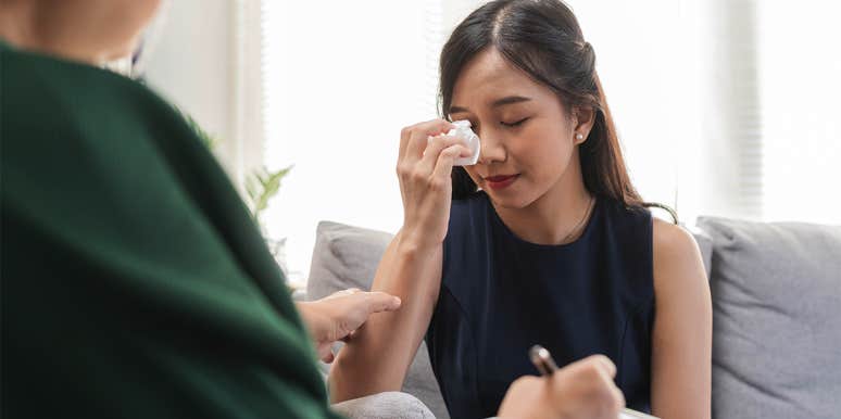 The Secret My Healthcare Providers Taught Me About My Breakup woman talking to therapist