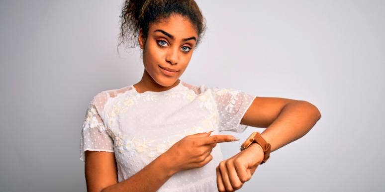 What To Do When Your Guy Lasts Too Long And It Hurts woman who's boyfriend lasts too long looking at watch