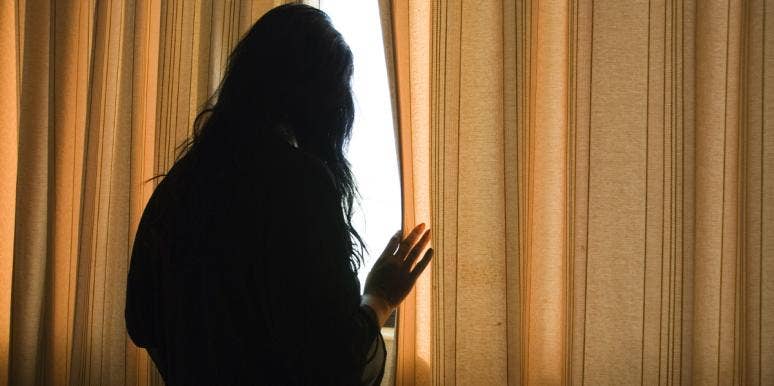When She Says You Hurt Her, You Don't Get To Decide You Didn't woman looking out window