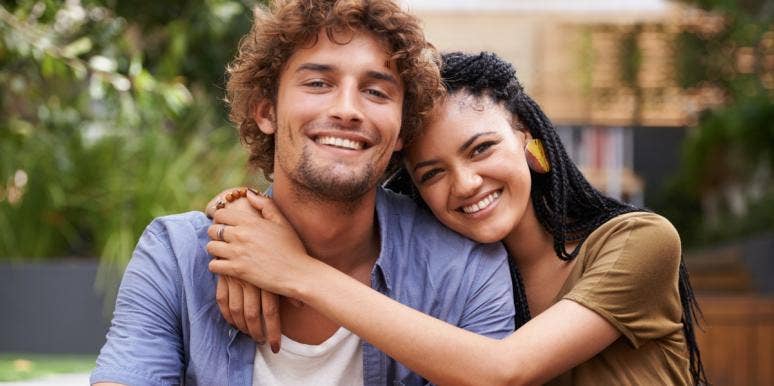 when two empaths fall in love smiling woman hugging smiling man